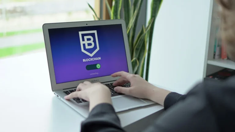 A small business employee at a laptop looking at a security alert