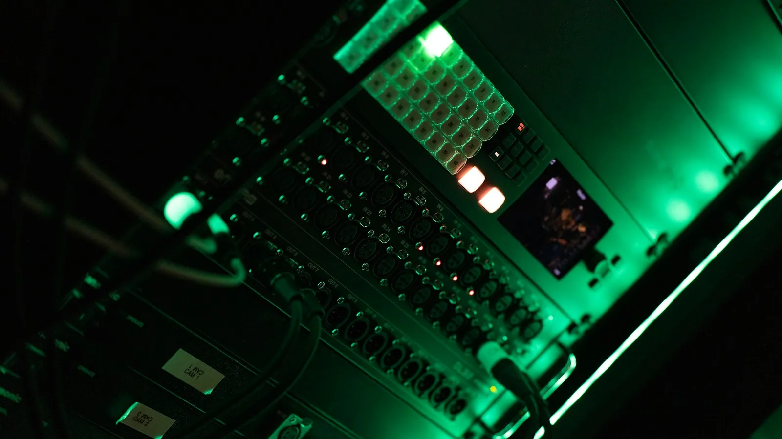 Rows of servers in a dimly lit data center