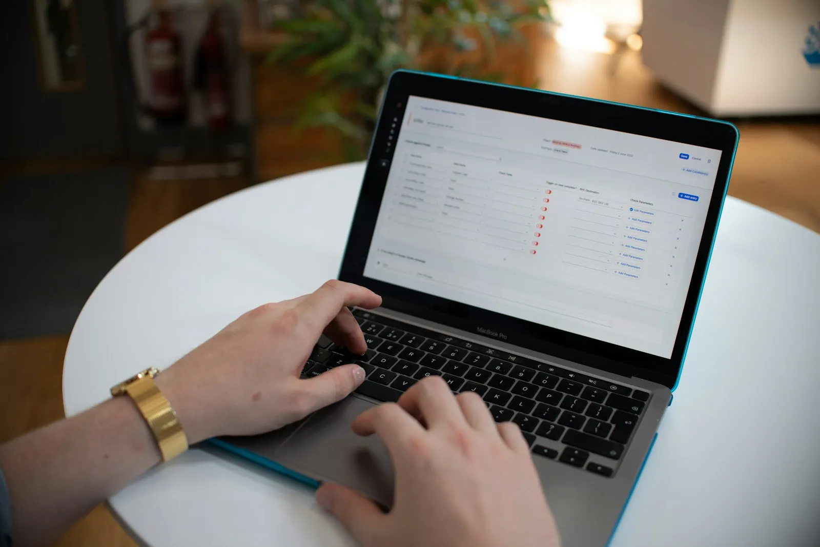 An office worker reviewing an automated approval workflow on a laptop screen