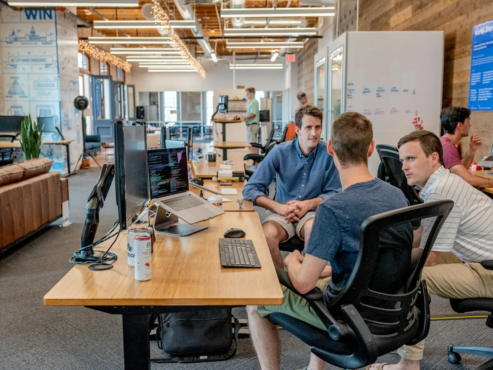 Coworkers working at computers in an open office