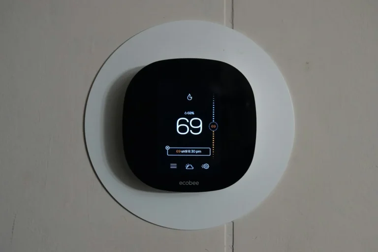Security camera mounted on the ceiling of a modern office