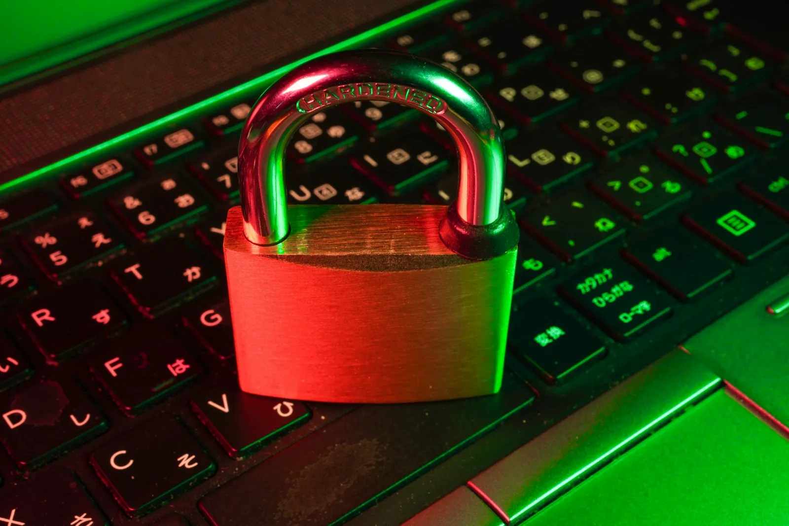 Laptop on an office desk showing a locked screen warning