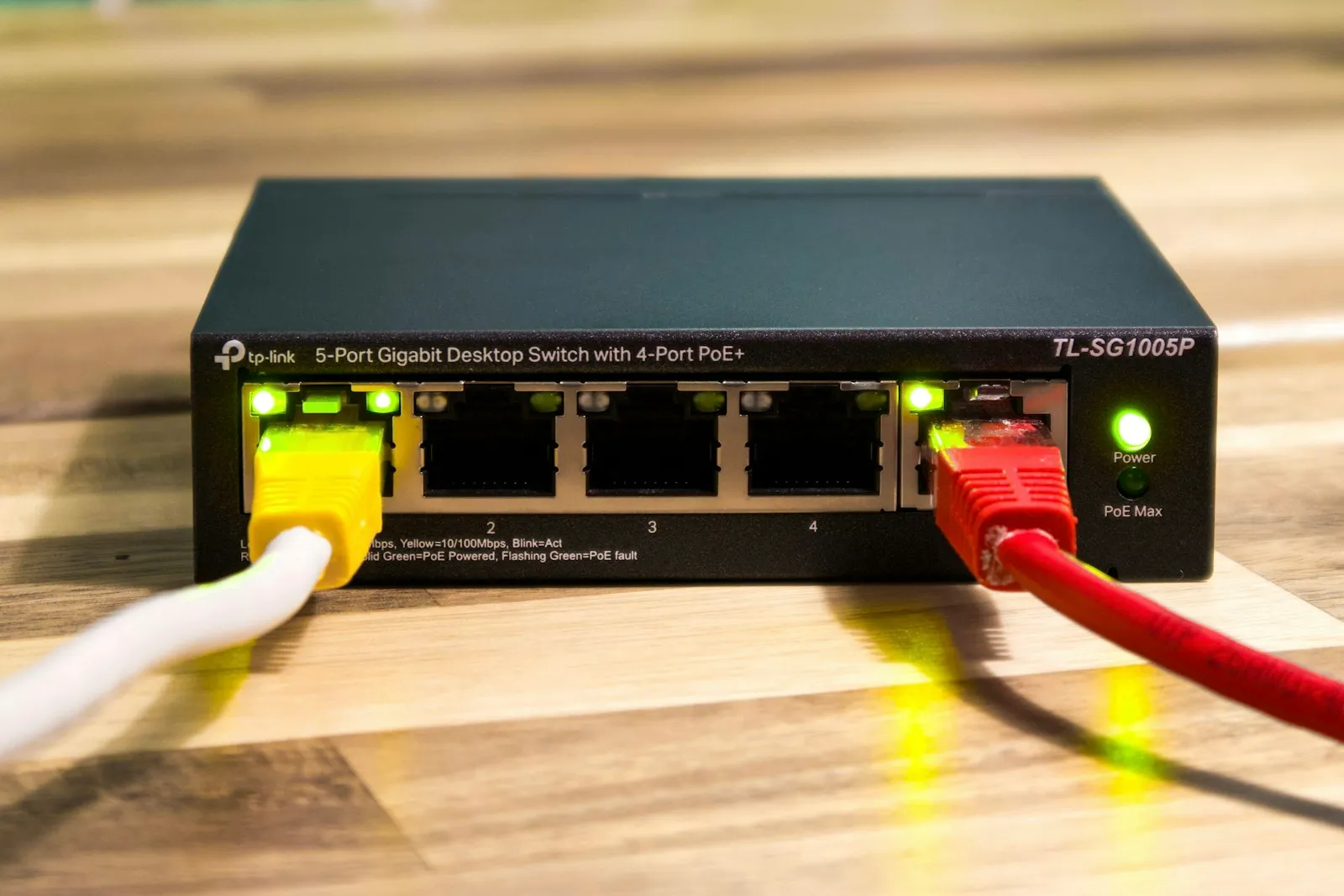 Network switches and patch cables in a small office equipment rack