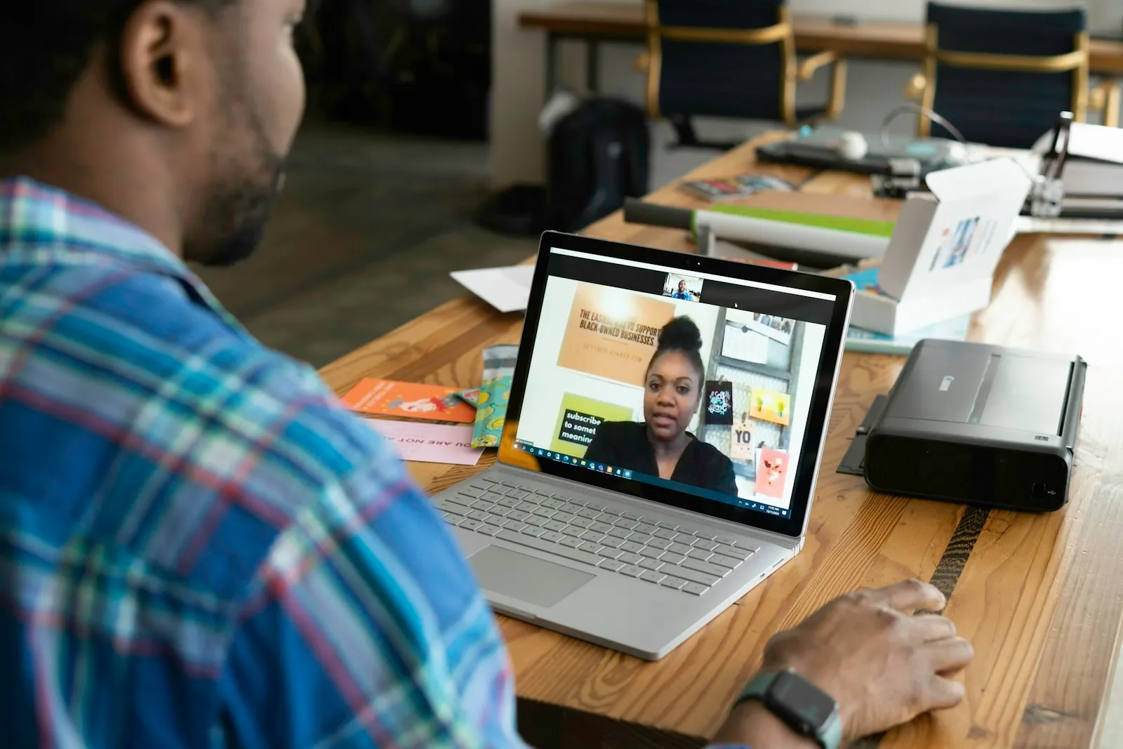 Person on a video call from a home office